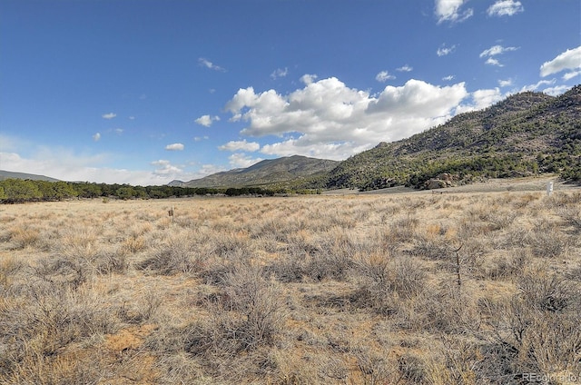 view of mountain feature featuring a rural view