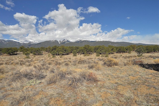 view of mountain feature with a rural view