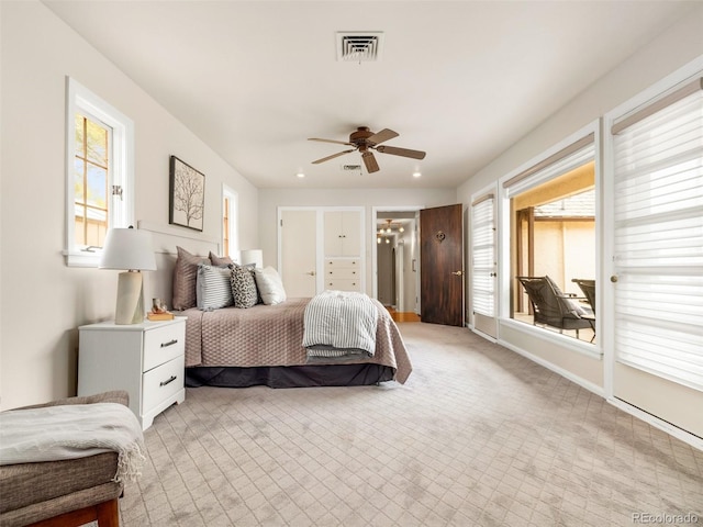 bedroom featuring ceiling fan and ensuite bathroom