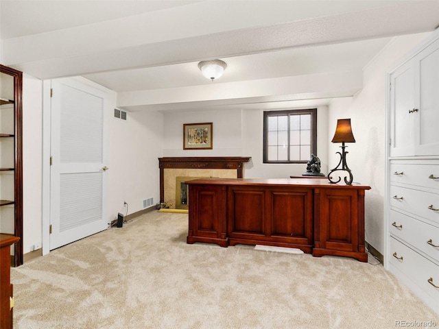 bedroom with light colored carpet