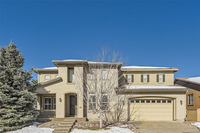 view of front of property with a garage