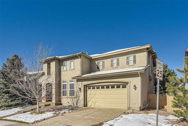 front of property with a garage