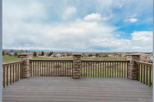 wooden deck featuring a residential view