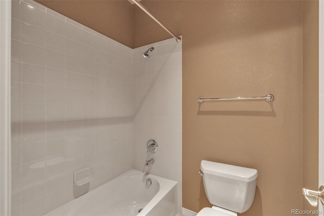 bathroom featuring toilet and shower / washtub combination