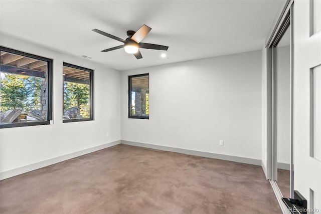 unfurnished bedroom with a closet, ceiling fan, and carpet floors