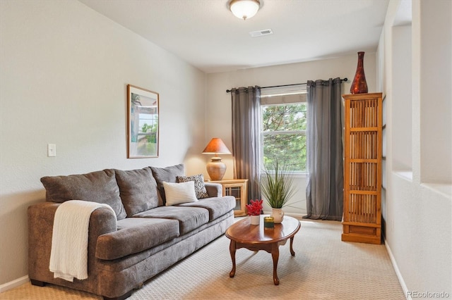 22932 E Ontario Dr Unit 102, Aurora, CO 80016 - living area featuring light colored carpet and baseboards