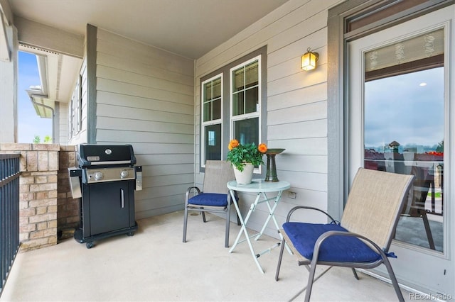 22932 E Ontario Dr Unit 102, Aurora, CO 80016 - porch featuring grilling area