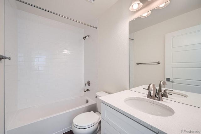 full bathroom featuring tub / shower combination, toilet, and vanity