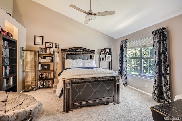 carpeted bedroom featuring vaulted ceiling and ceiling fan