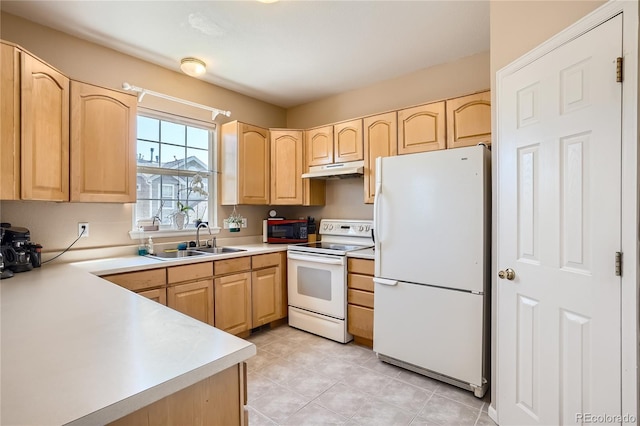 kitchen with light tile patterned floors, white appliances, light brown cabinetry, and sink