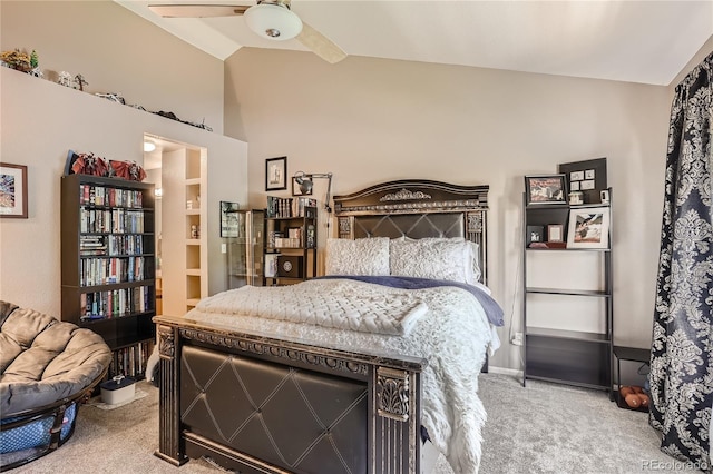 carpeted bedroom with vaulted ceiling and ceiling fan