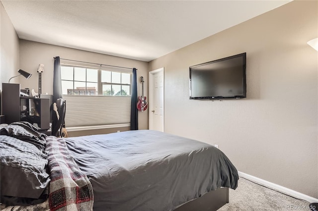 bedroom featuring carpet flooring