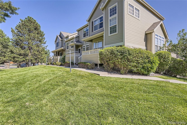 view of home's exterior featuring a lawn