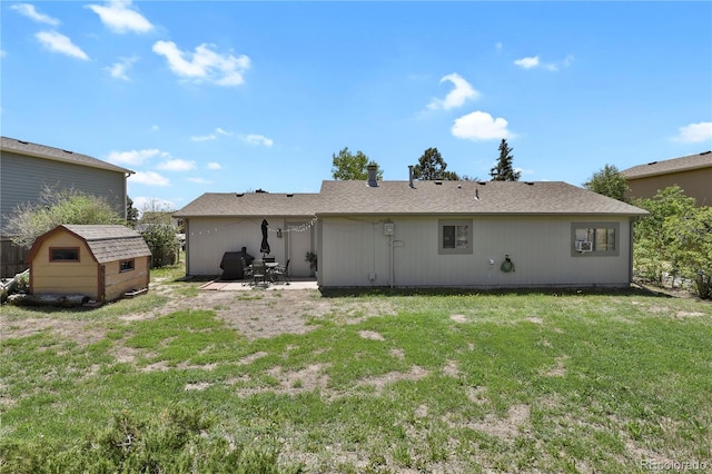 2185 Ambleside Dr, Colorado Springs, CO 80915 - back of house featuring a patio area and a lawn