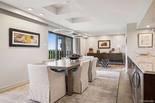 460 S Marion Pkwy Unit 1856, Denver, CO 80209 - dining area featuring light wood-type flooring and recessed lighting