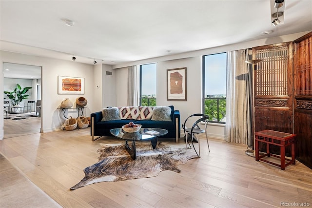 460 S Marion Pkwy Unit 1856, Denver, CO 80209 - living room with light wood-style flooring