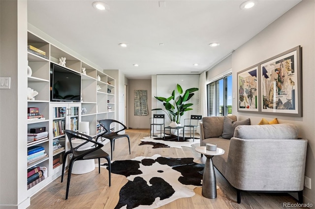 460 S Marion Pkwy Unit 1856, Denver, CO 80209 - living room featuring light wood finished floors and recessed lighting