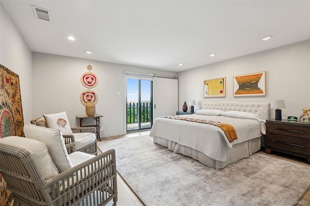 460 S Marion Pkwy Unit 1856, Denver, CO 80209 - bedroom featuring access to outside, recessed lighting, and light wood finished floors