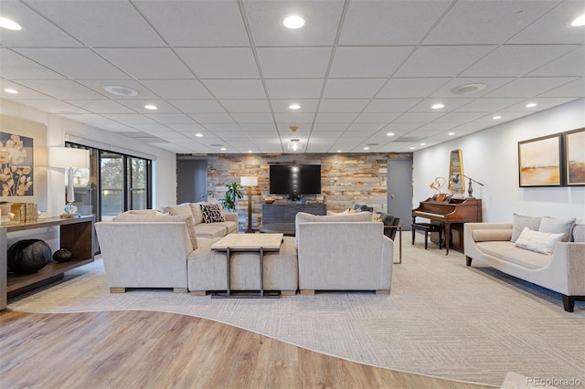 460 S Marion Pkwy Unit 1856, Denver, CO 80209 - living area featuring light wood-style flooring, a paneled ceiling, and recessed lighting