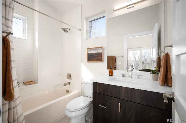 full bath featuring vanity, toilet, and shower / bath combo with shower curtain