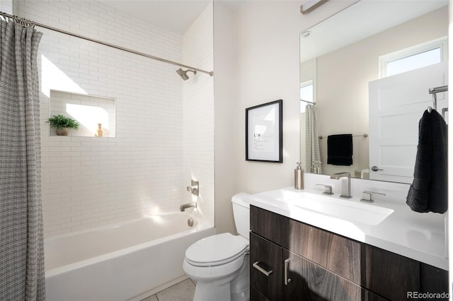 full bathroom featuring shower / bathtub combination with curtain, toilet, vanity, and tile patterned flooring