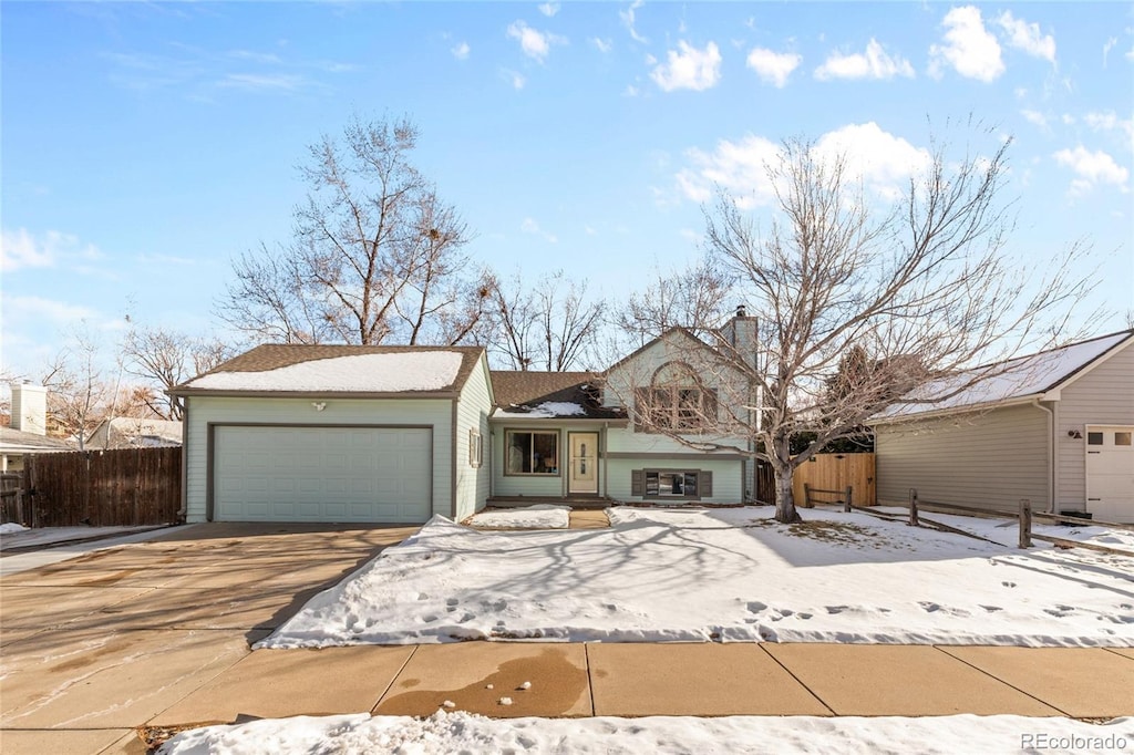 ranch-style home with a garage