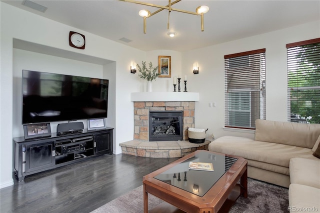 10609 Chadsworth Ln, Highlands Ranch, CO 80126 - living area featuring wood finished floors, a chandelier, and a fireplace