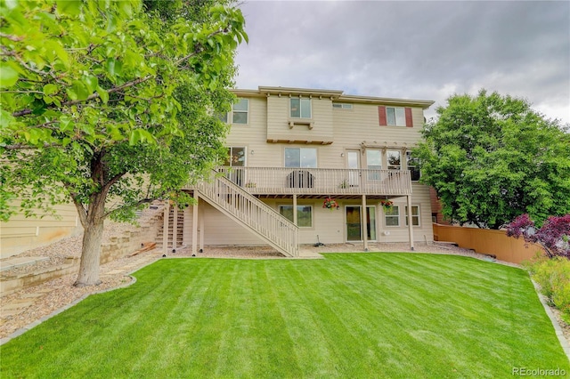 10609 Chadsworth Ln, Highlands Ranch, CO 80126 - back of house with stairway and a wooden deck