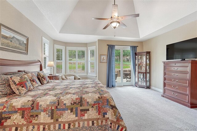 9121 Sunshine Meadow Pl, Parker, CO 80134 - bedroom with access to exterior, light colored carpet, a ceiling fan, vaulted ceiling, and baseboards