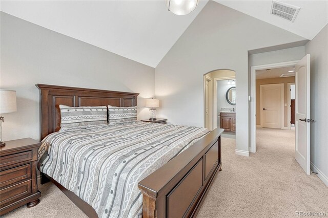 9121 Sunshine Meadow Pl, Parker, CO 80134 - bedroom with light colored carpet, arched walkways, high vaulted ceiling, and baseboards