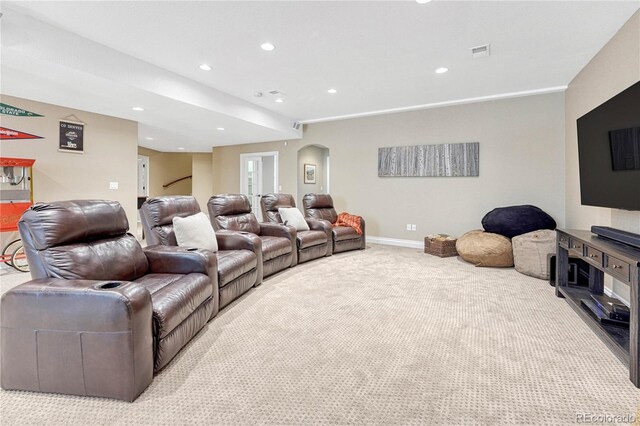 9121 Sunshine Meadow Pl, Parker, CO 80134 - cinema room with carpet flooring, arched walkways, recessed lighting, and baseboards
