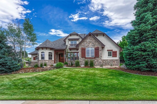 9121 Sunshine Meadow Pl, Parker, CO 80134 - french provincial home with stone siding, stucco siding, and a front yard