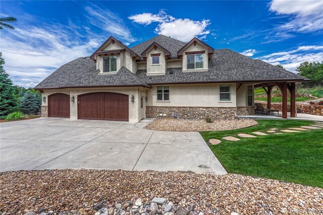 9121 Sunshine Meadow Pl, Parker, CO 80134 - view of front of house featuring stucco siding, stone siding, concrete driveway, an attached garage, and a shingled roof