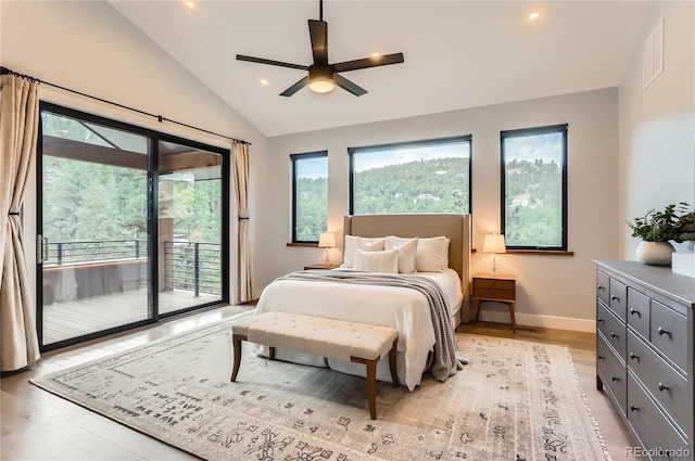 795 Pine Brook Rd, Boulder, CO 80304 - bedroom featuring access to outside, multiple windows, vaulted ceiling, light wood-type flooring, and recessed lighting