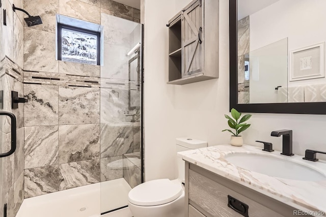 795 Pine Brook Rd, Boulder, CO 80304 - full bathroom featuring a shower stall, toilet, and vanity