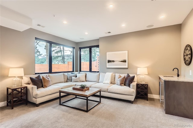 795 Pine Brook Rd, Boulder, CO 80304 - living room featuring baseboards, light colored carpet, recessed lighting, and wet bar