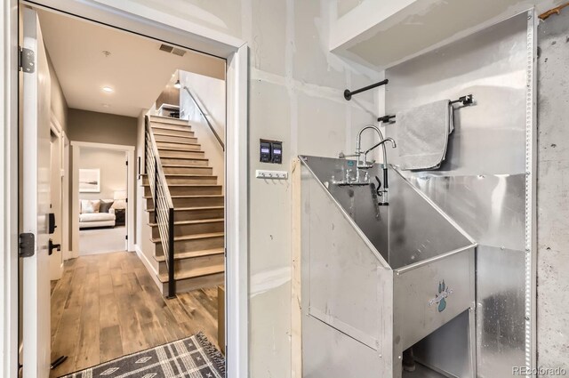 795 Pine Brook Rd, Boulder, CO 80304 - stairs featuring wood finished floors
