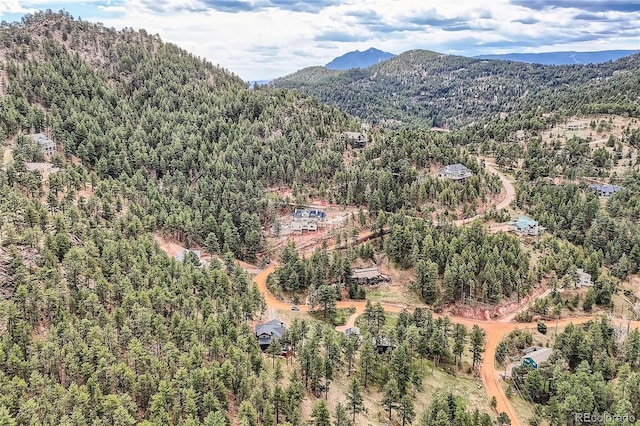795 Pine Brook Rd, Boulder, CO 80304 - drone / aerial view of a heavily wooded area and mountains