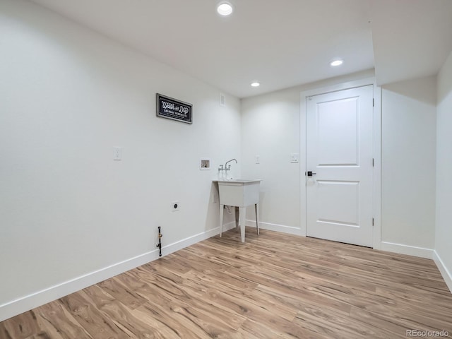 35 Everett St, Lakewood, CO 80226 - laundry area with hookup for an electric dryer, washer hookup, light wood-type flooring, recessed lighting, and baseboards