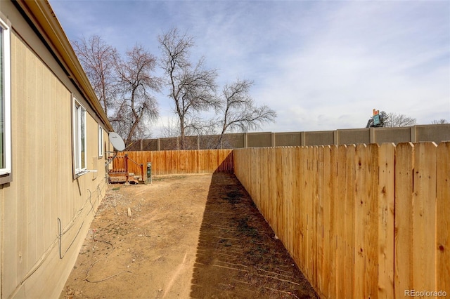 view of yard featuring a fenced backyard