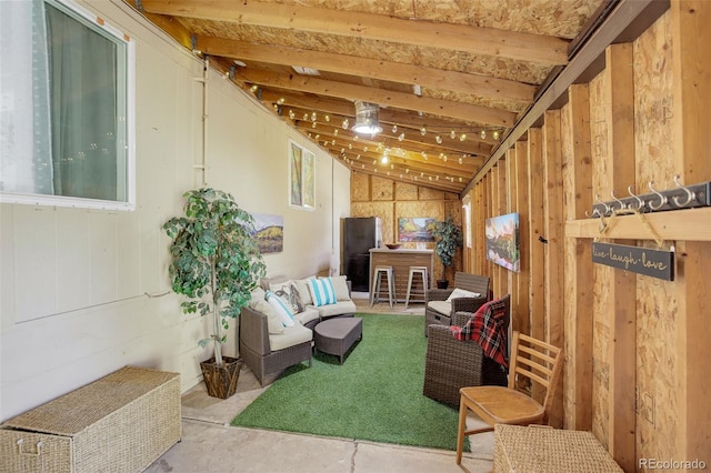 living area with lofted ceiling