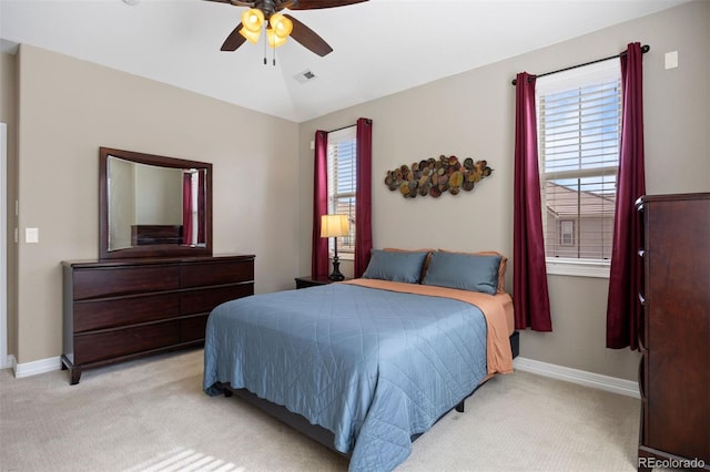 10127 Bluffmont Ln, Lone Tree, CO 80124 - bedroom with light colored carpet, baseboards, and a ceiling fan