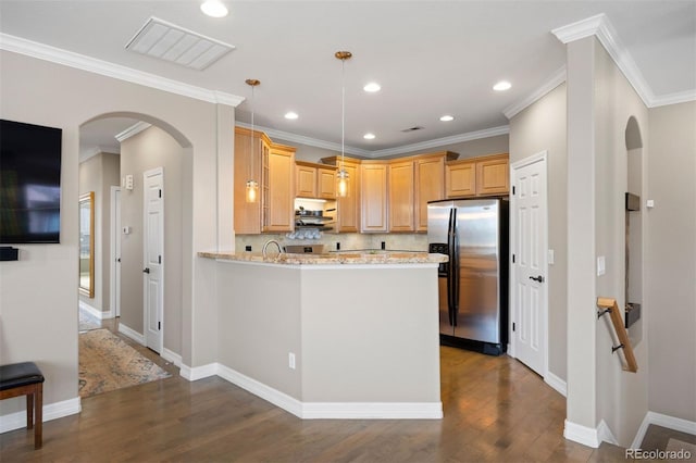 10127 Bluffmont Ln, Lone Tree, CO 80124 - kitchen featuring stainless steel refrigerator with ice dispenser, arched walkways, dark wood-style flooring, a peninsula, and recessed lighting