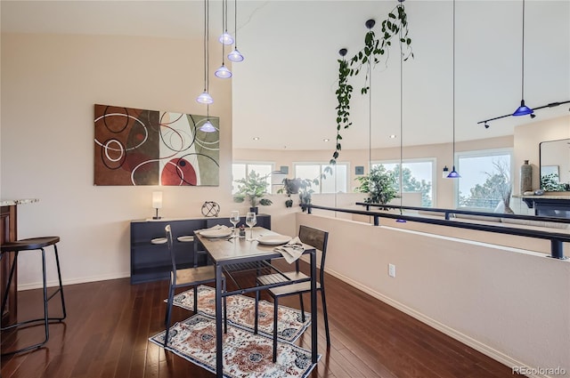 3001 Eagle Ridge Rd, Longmont, CO 80503 - dining room with baseboards and dark wood-style flooring