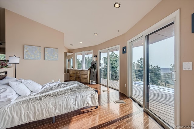 3001 Eagle Ridge Rd, Longmont, CO 80503 - bedroom with access to exterior, wood-type flooring, and recessed lighting