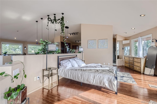 3001 Eagle Ridge Rd, Longmont, CO 80503 - bedroom with wood finished floors and recessed lighting
