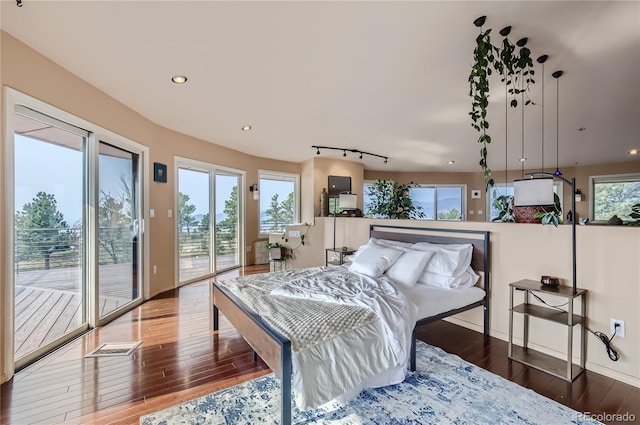 3001 Eagle Ridge Rd, Longmont, CO 80503 - bedroom featuring wood-type flooring, access to outside, and recessed lighting