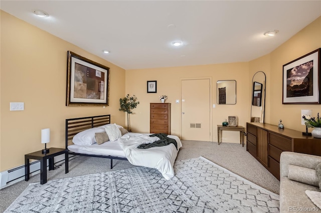 3001 Eagle Ridge Rd, Longmont, CO 80503 - carpeted bedroom featuring a baseboard heating unit and recessed lighting