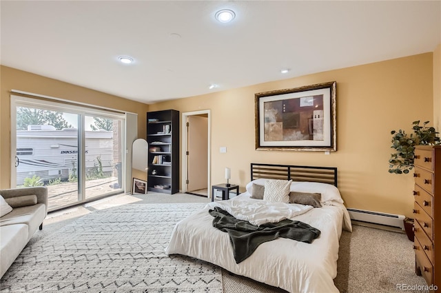 3001 Eagle Ridge Rd, Longmont, CO 80503 - carpeted bedroom featuring a baseboard radiator, access to outside, and recessed lighting