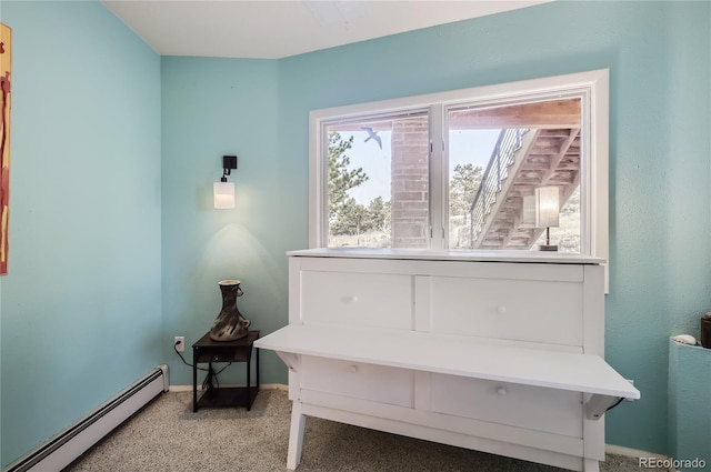 3001 Eagle Ridge Rd, Longmont, CO 80503 - sitting room featuring a baseboard heating unit and baseboards
